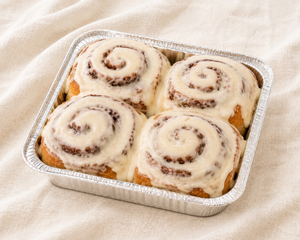A pan of frosted sourdough cinnamon rolls from Beechwood Cottage Bakery